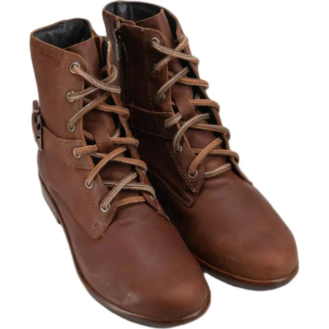 Overhead view of a pair of Naot Women's Alize Boots featuring a sleek design with faux buckles, smooth brown leather uppers, size zipper, and decorative leather laces.