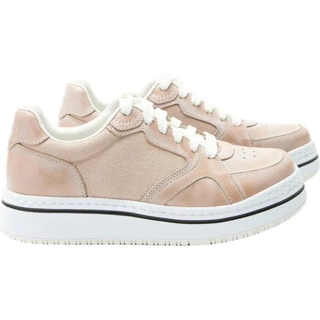 Lateral side of a pair of Women's Alegria Alyster Shoe in blush pink leather with a white sole
