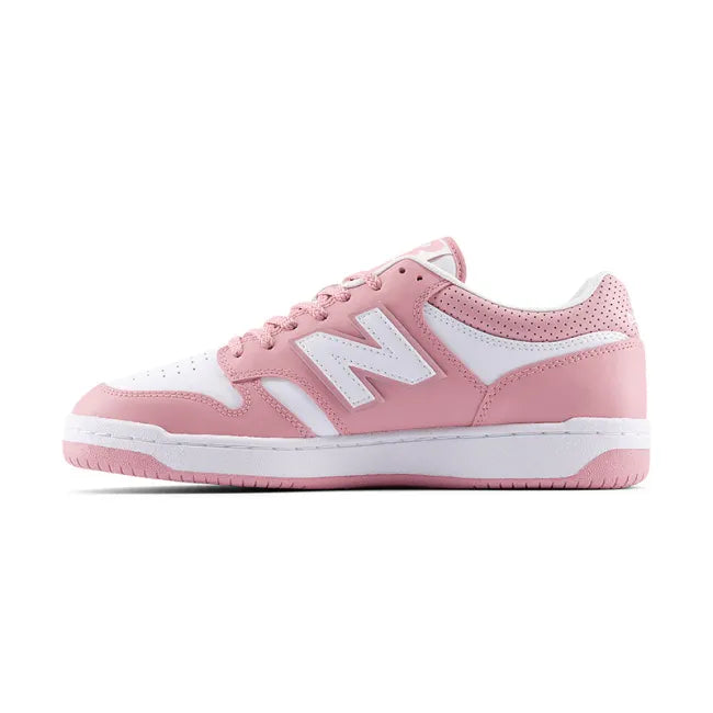 White &amp; pink New Balance 480 sneaker shown from the medial side, with the white "N" logo