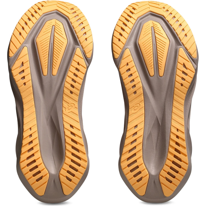 Soles of ASICS Women&