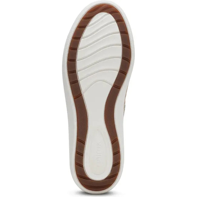 White sole of Women's Aetrex Charlotte Arch Support Sneaker in Black leather upper