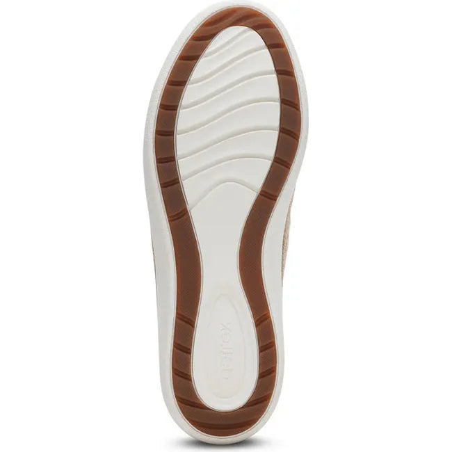 White sole of Women's Aetrex Charlotte Arch Support Sneaker in Tan leather upper