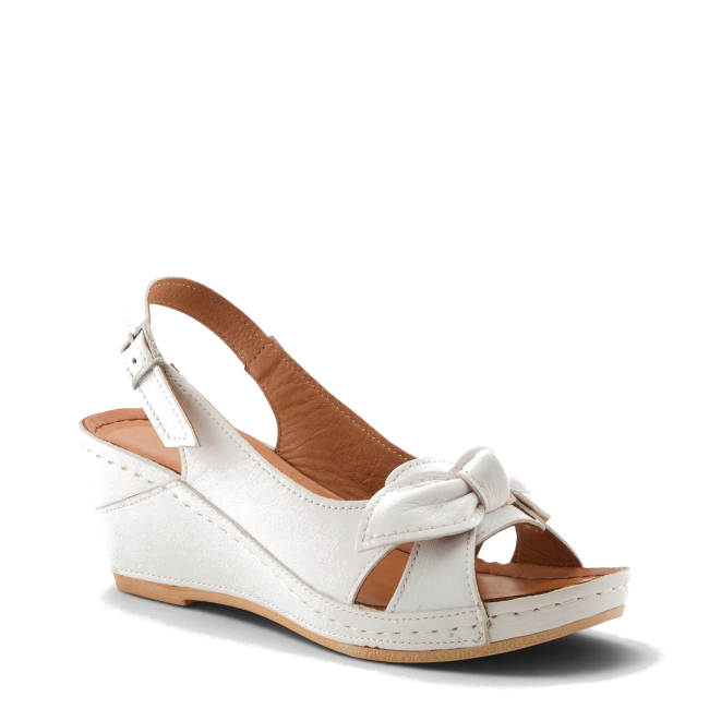 Front angled view of white leather Spring Step Women's Chassidy Wedge Sandal with bow detail