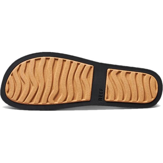 Sole of Women's Reef Water Vista Sandal in black and tan
