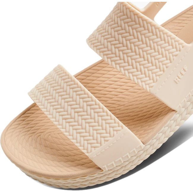 Close up of the front of Womens Reef Water Vista Sandal in vintage oasis beige with two straps