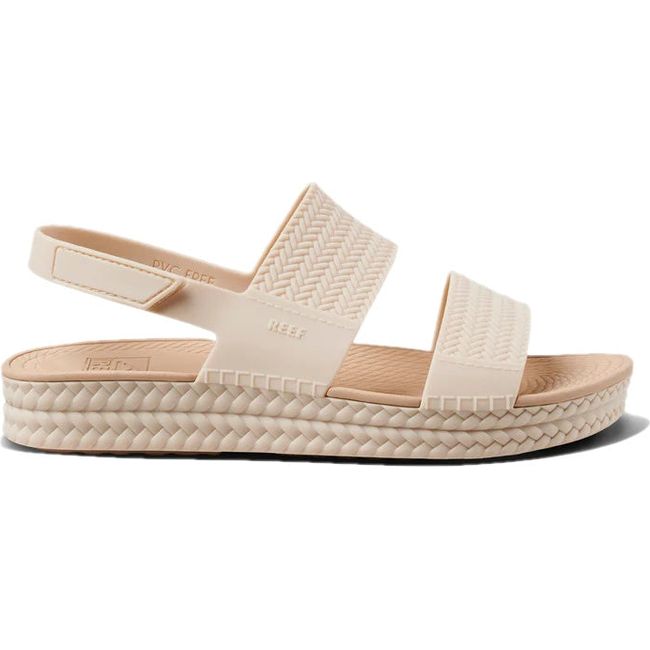 Lateral side of Women's Reef Water Vista Sandal in vintage oasis beige with velcro backstrap