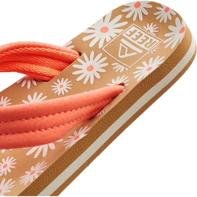 Heel close up of Kids' Reef Ahi Flip Flop with Daisy floral design and orange strap