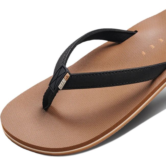 Close up of Women's Reef Solana Flip Flop Sandal in Black and Tan