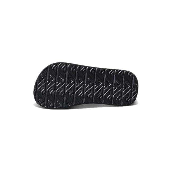 Sole of Kids Reef Little Ahi Sandal in Aquifer Palm black and blue upper and black tread