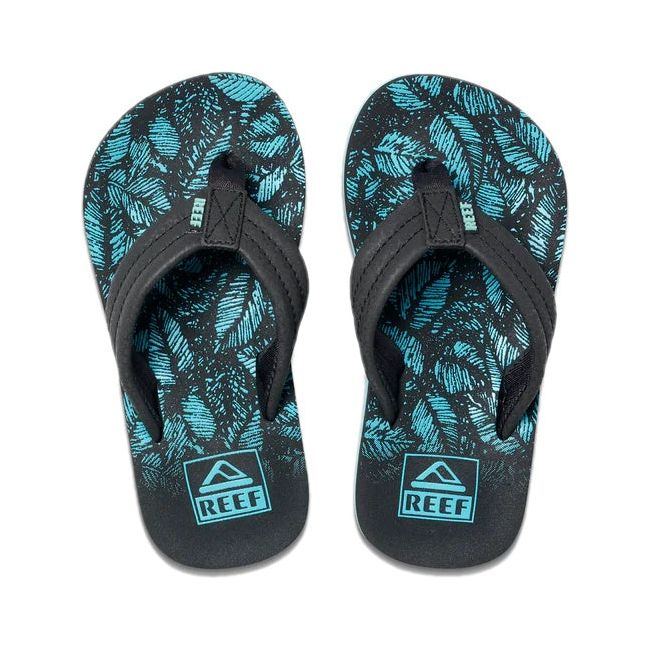 Top down view of Kids' Reef Ahi Flip Flops in Aquifer Palm black and blue