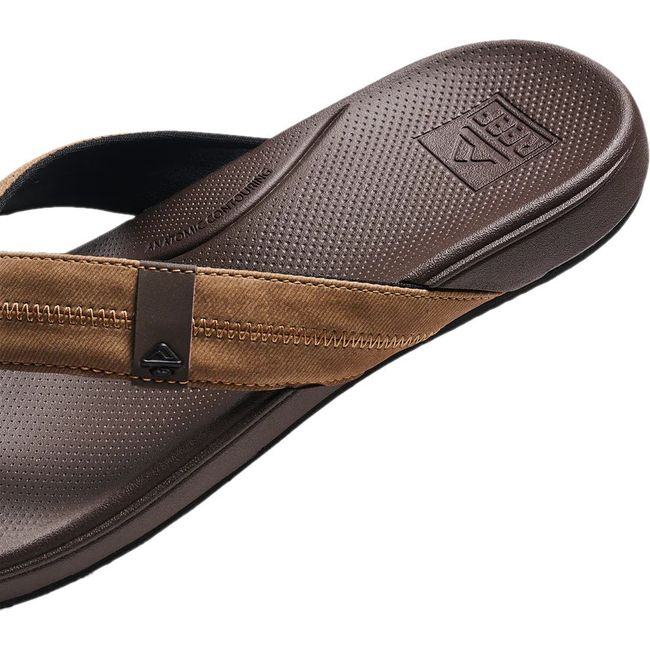 Close up heel view of Men's Reef Cushion Phantom 2.0 Flip Flop in Brown and Tan