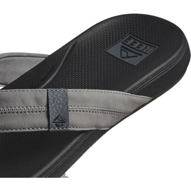 Close up heel view of Men's Reef Cushion Phantom 2.0 Flip Flop in shadded grey