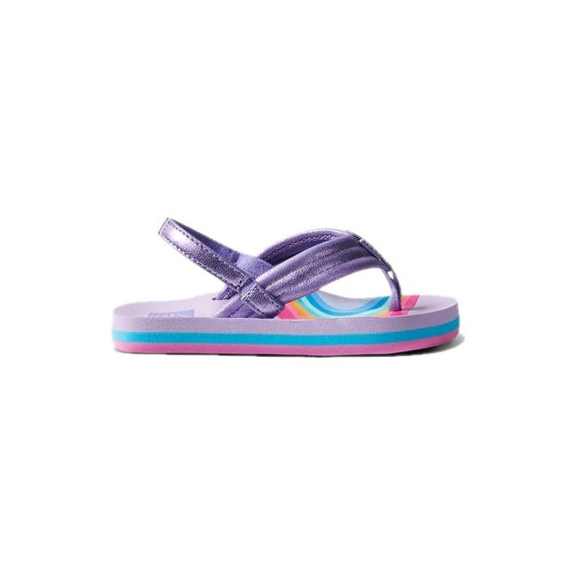 Lateral side of Kids' Reef Little Ahi Sandal in Candyland purple with rainbow patterns
