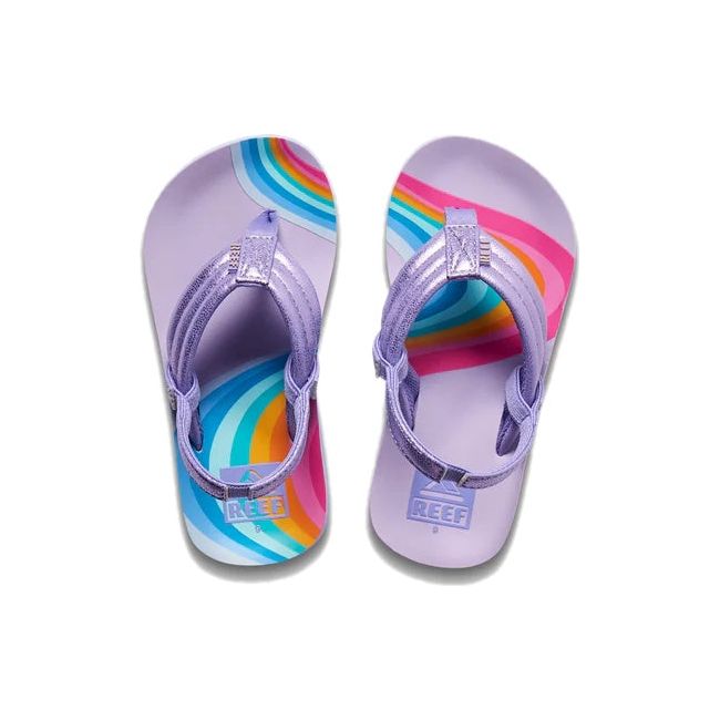 Top down view of Kids' Reef Little Ahi Sandals in Candyland purple with rainbow patterns