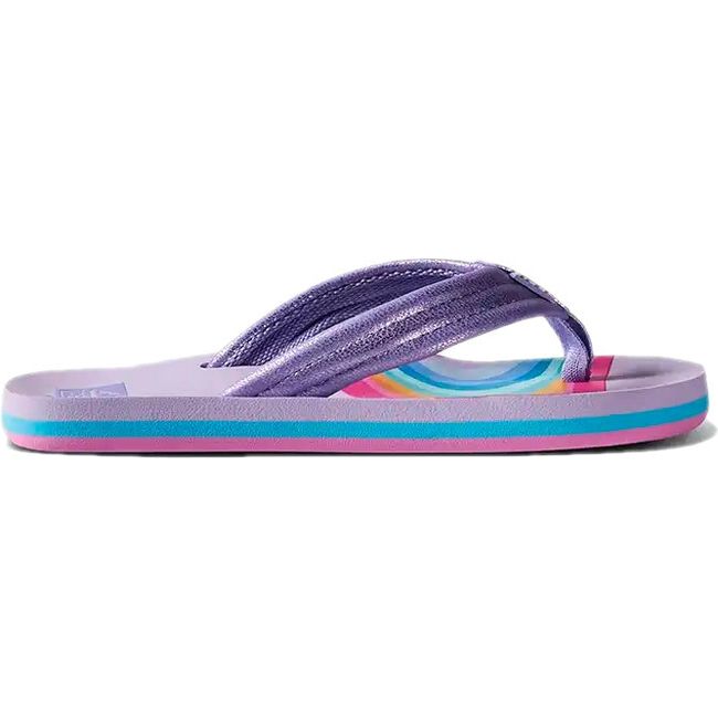 Lateral side of Kids' Reef Ahi Flip Flop in Candyland purple with rainbow patterns