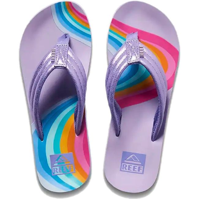 Top down view of Kids' Reef Ahi Flip Flop in Candyland purple with rainbow patterns