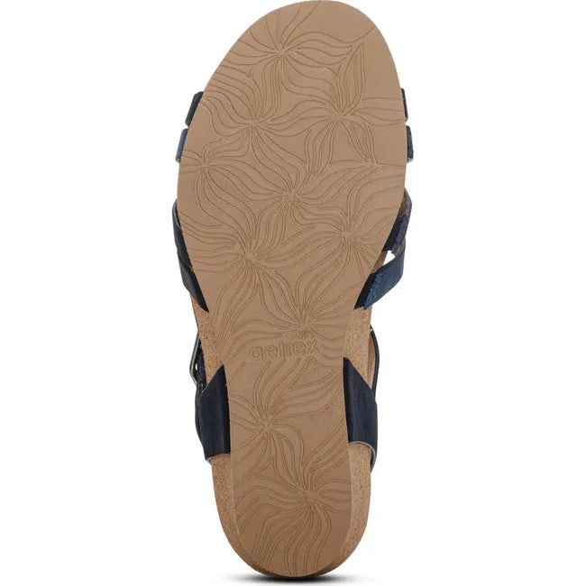 Tan sole of Women's Aetrex Noelle Arch Support Wedge Sandal in Ivory upper