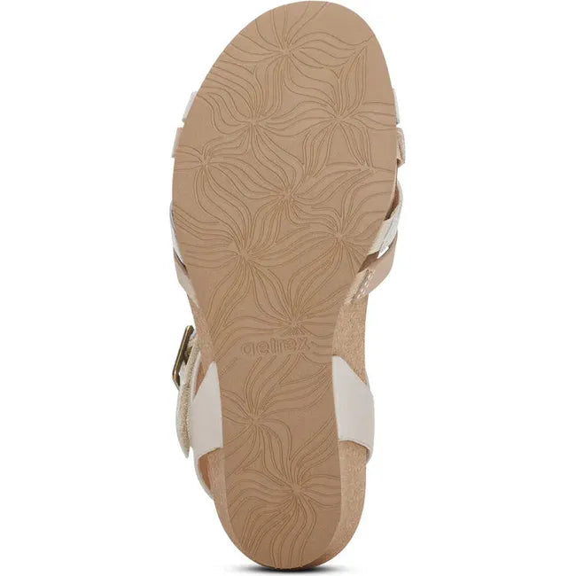 Tan sole of Women's Aetrex Noelle Arch Support Wedge Sandal in Ivory upper