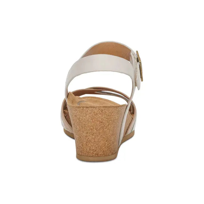 Heel of Women's Aetrex Noelle Arch Support Wedge Sandal in Ivory with a back strap