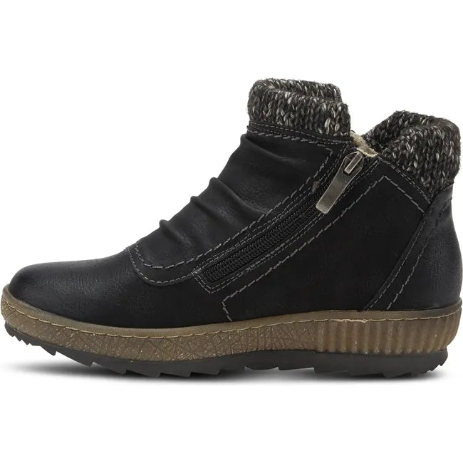 Medial of Womens Spring Step Cleora Boot in black leather with a side zipper and faux shearling