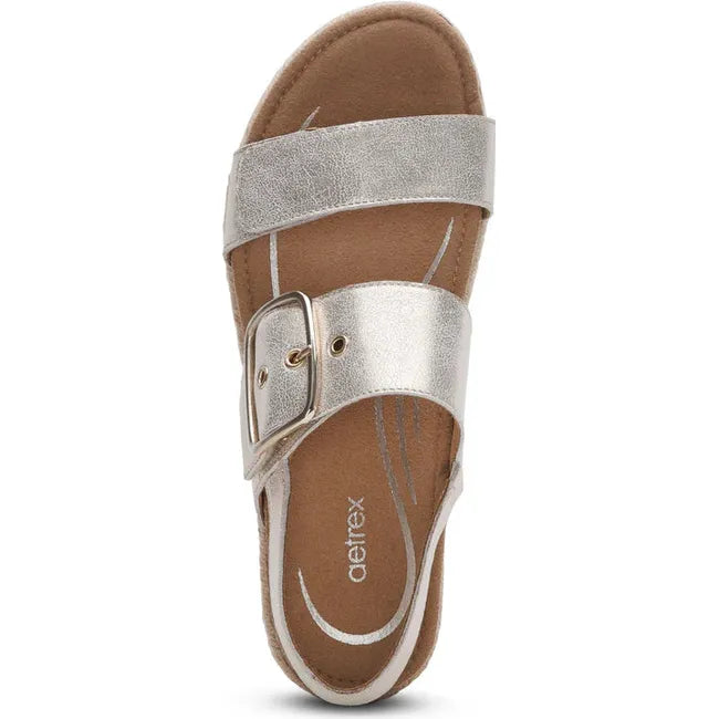 Top down view of Women's Aetrex Vania Arch Support Platform Sandal in champagne with velcro