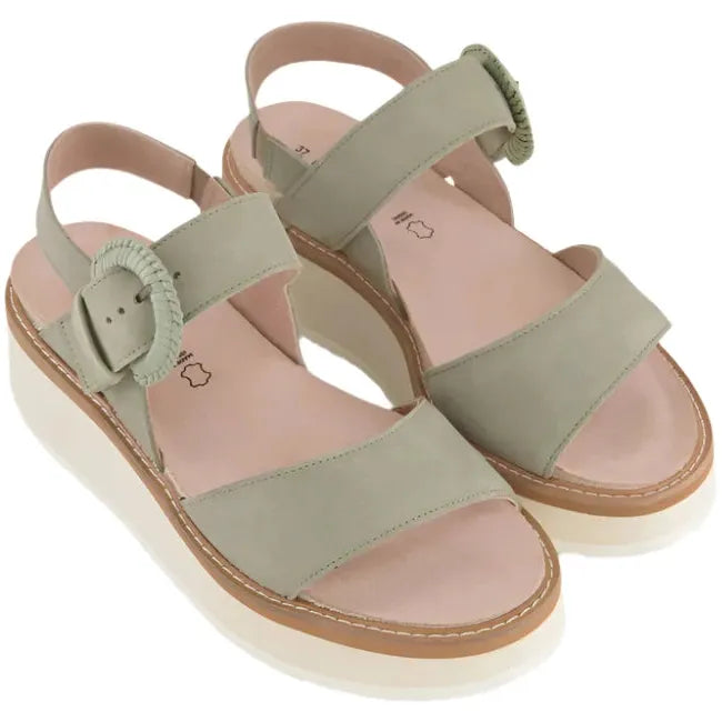 Overhead view of a pair of Sage Nubuck Naot Women's Crepe Platform Sandals showcasing the 2.2-inch white EVA platform soles, buckle closures, and anatomic cork and latex footbeds wrapped in suede.