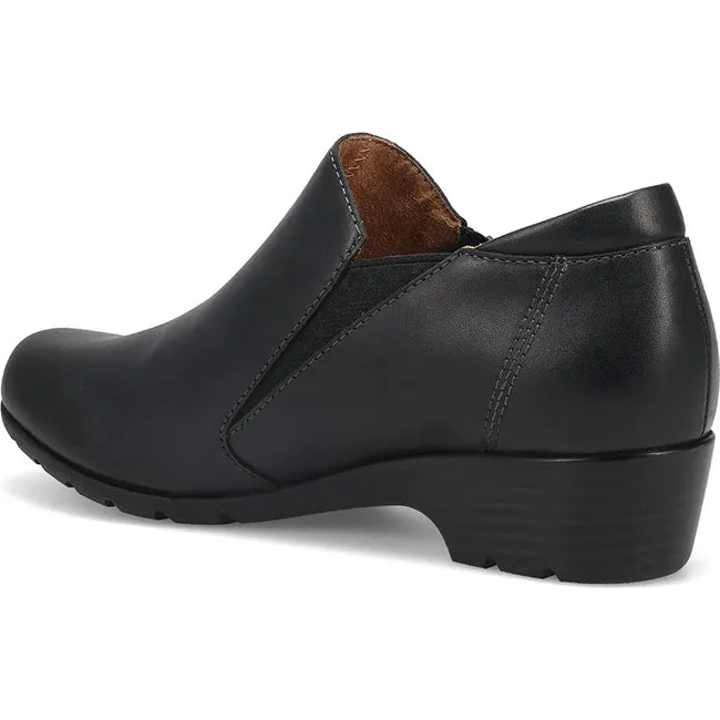 Heel of Women's Taos Daily Bootie in Black leather with medial side zipper