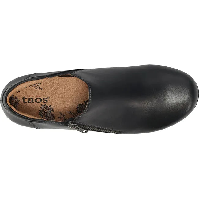 Upper of Women's Taos Daily Bootie in Black leather with medial side zipper