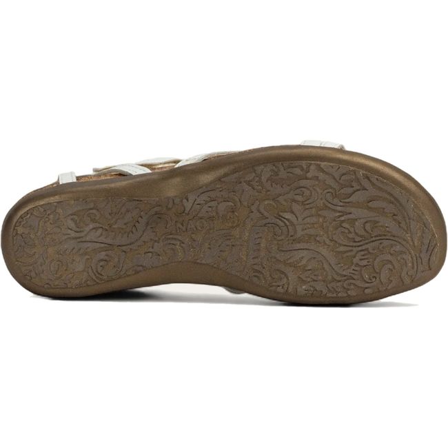 Sole  of Naot Women's Dorith Sandal in white leather upper, cork midsole, and brown tread