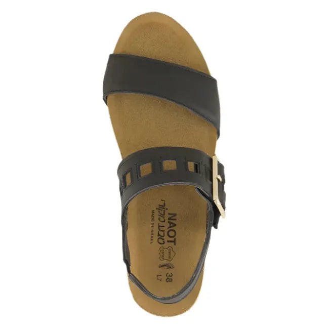 Top view of Naot Women's Dynasty Wedge Sandals in black leather, showcasing the hook and loop closures for adjustability and the brown suede anatomic cork and latex footbeds.