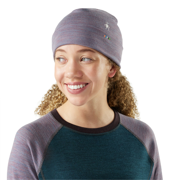 Women Wearing Smartwool Women&#39;s Thermal Merino Reversible Cuffed Beanie in Garden Pink