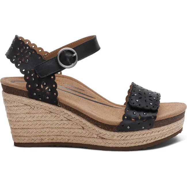 Lateral side of Women's Aetrex Sydney Espadrille Wedge Sandal in Black Cutout with back strap