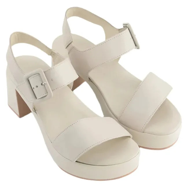 Overhead view of a pair of Naot Women's Glamour Heels in ivory showcasing the elegant design, leather-wrapped latex footbeds, and supportive straps.