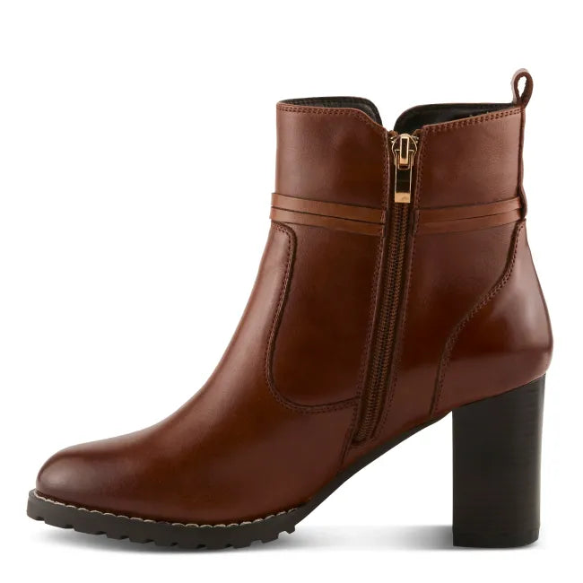 Medial side of heeled Spring Step Women's Gyanna Boot in cognac brown leather with side zip