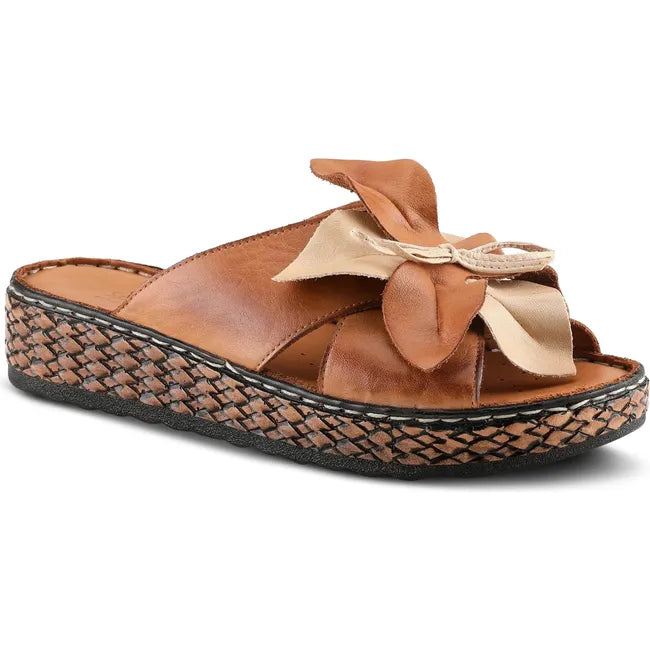 Front angled view of Women's Spring Step Sandal Hilary Slide in camel brown leather with flower bow