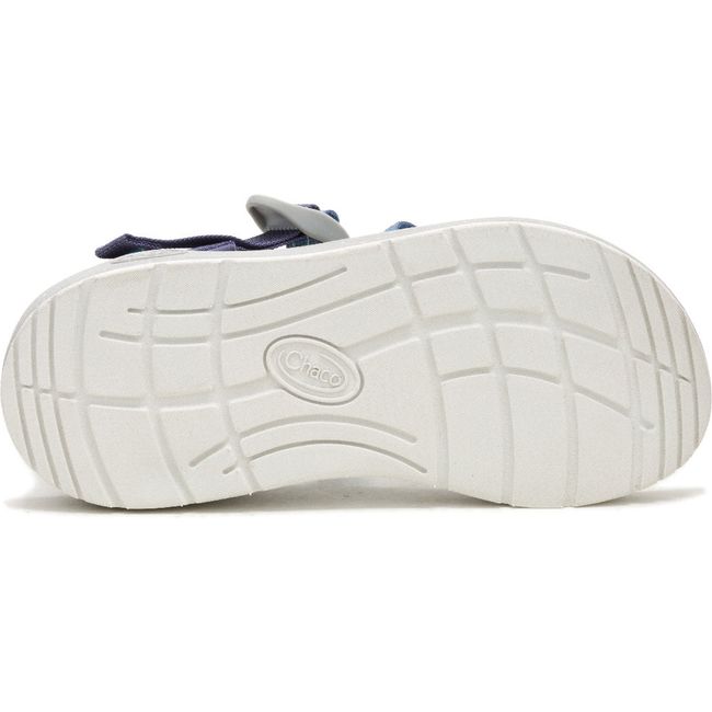 White sole of Women&#39;s Chaco CushZ Extra Cushioned Sandal in Frond Pacific Blue upper