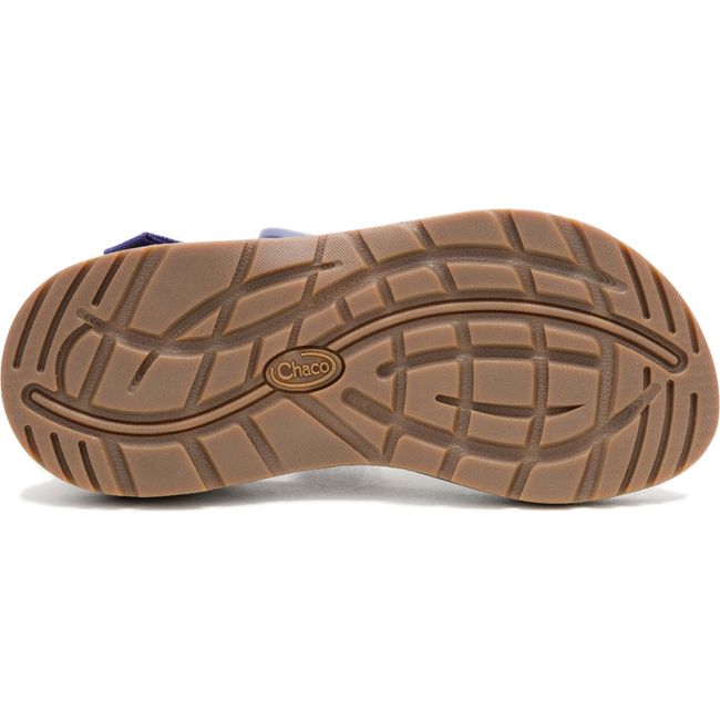 Tan sole of Women's Chaco Mega Z/1 Classic Sandal in Paddle Grape purple upper