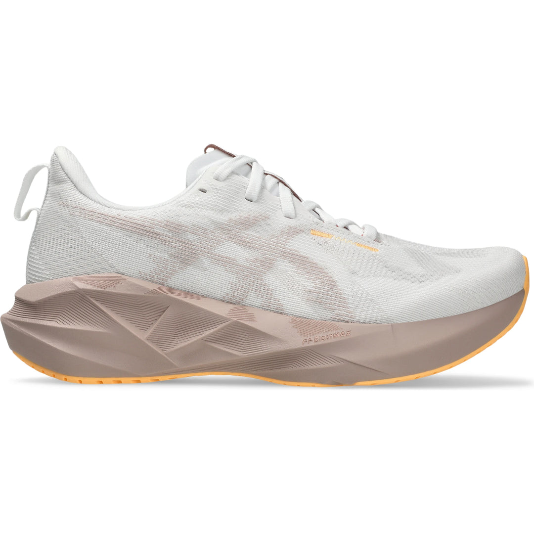 Side of ASICS Women's Novablast 5 Running Shoe in White/Fawn