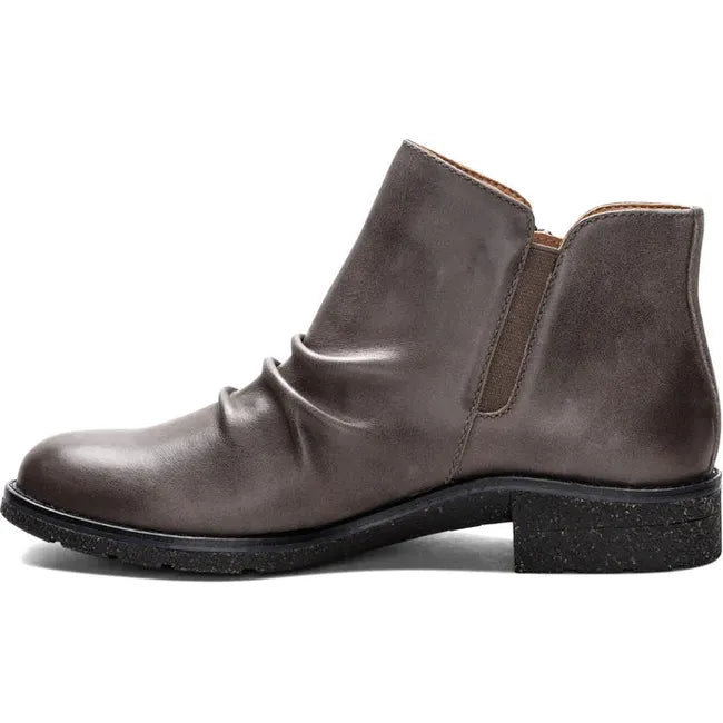 Medial side of Women's Aetrex Mila Arch Support Low Boot in charcoal grey leather with side zipper