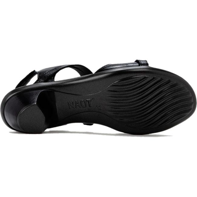 Sole of Naot Women's Limit Heel in black crinkle patent leather upper and black tread