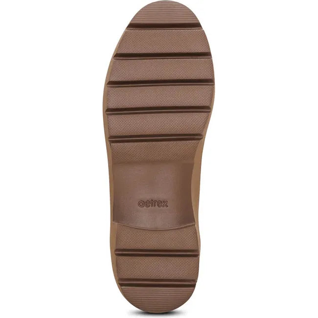 Tan sole of Women's Aetrex Collette Arch Support Penny Loafer in Cognac leather upper