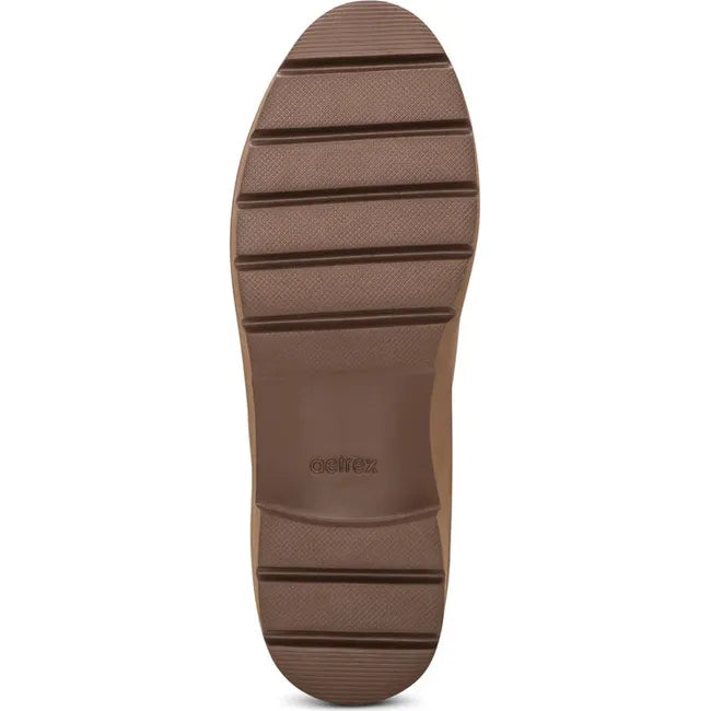 Sole of of Women's Aetrex Hannah Arch Support Chelsea Boot in tan leather upper