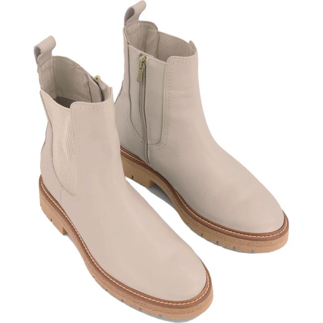 Pair of Naot Women's Main Chelsea Boots in soft ivory leather