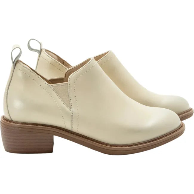 Lateral side of Women's Alegria Merle Ankle Boots in gold cream leather upper with brown outsole