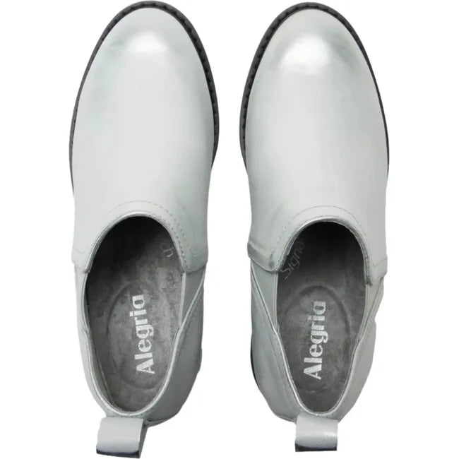Top down view of Women's Alegria Merle Ankle Boots in silver leather upper with slip on entry
