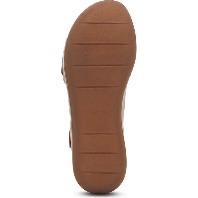 Sole of Womens Aetrex Ariel Adjustable Arch Support Wedge Sandal in Sand tan upper