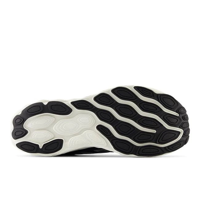 White sole of New Balance Fresh Foam X 880 V14 Running Shoe in black and white