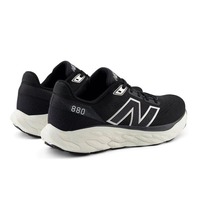 Pair of New Balance Fresh Foam X 880 V14 Running Shoes in black and white