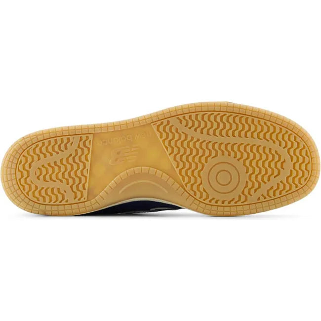 Sole of Unisex New Balance 480 sneakers with a gum sole.