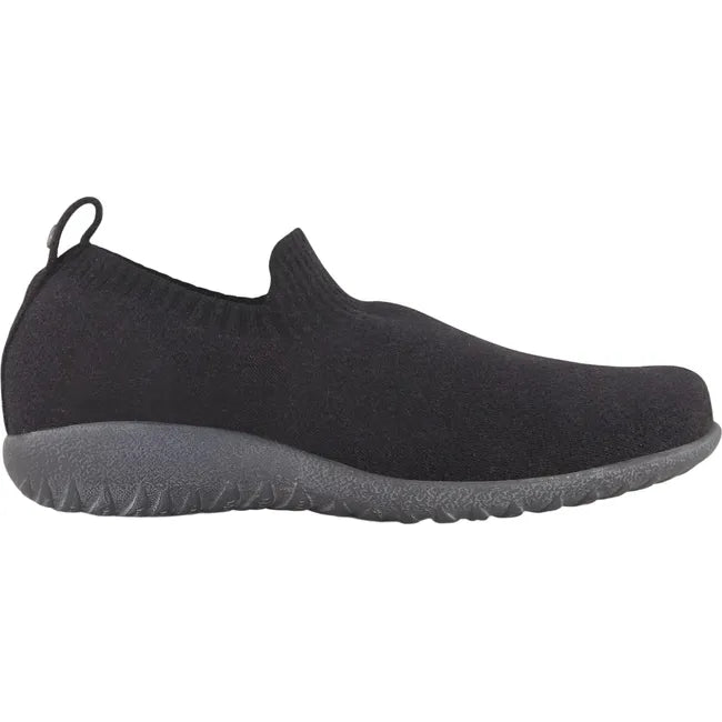 Lateral side view of Naot Women's Nuku Slip-On Shoe in black vegan material, featuring a breathable knit upper, padded heel for comfort, and a 1-inch slip-resistant polyurethane sole.